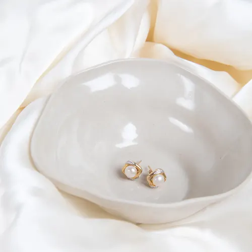 yellow gold pearl and diamond stud earrings